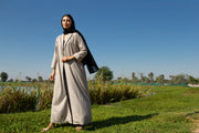 Beige abaya with black piping