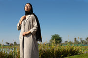 Beige abaya with black piping
